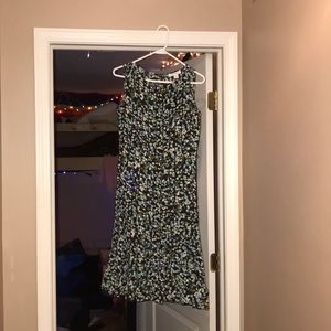 Green and black float dress